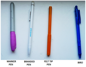 4 pens on a white background. A pink marker, a white branded pen, an orange felt tip pen and a blue biro.