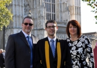 Jason and his parents on his College of Optometrists graduation in Westminster